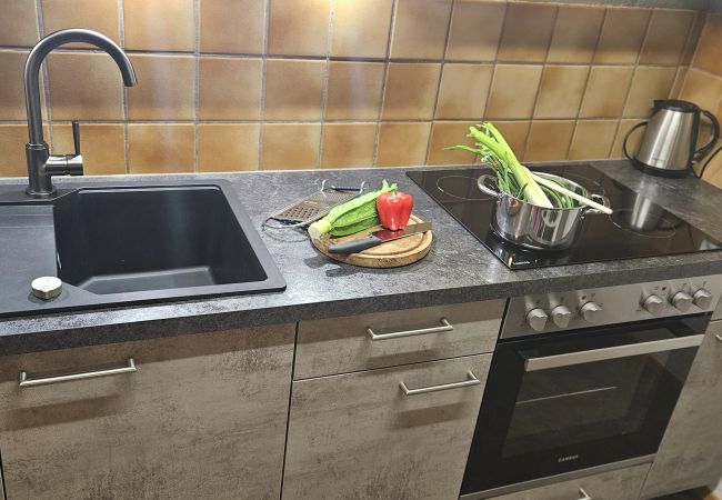 Ferienwohnung in Vulpera - Chasa La Plavna: Charmante 2.5 Zimmerwohnung mit grossem Balkon Nähe Golfplatz Ferienwohnung in Vulpera - Chasa La Plavna: Charmante 2.5 Zimmerwohnung mit grossem Balkon Nähe Golfplatz