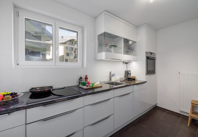 Ferienwohnung in Vulpera - Chasa Valbernard 4105: Grosszügige 3.5-Zimmerwohnung mit Komfort und Bergblick Ferienwohnung in Vulpera - Chasa Valbernard 4105: Grosszügige 3.5-Zimmerwohnung mit Komfort und Bergblick