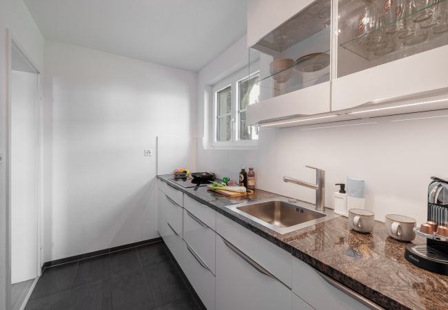Ferienwohnung in Vulpera - Chasa Valbernard 4105: Grosszügige 3.5-Zimmerwohnung mit Komfort und Bergblick Ferienwohnung in Vulpera - Chasa Valbernard 4105: Grosszügige 3.5-Zimmerwohnung mit Komfort und Bergblick