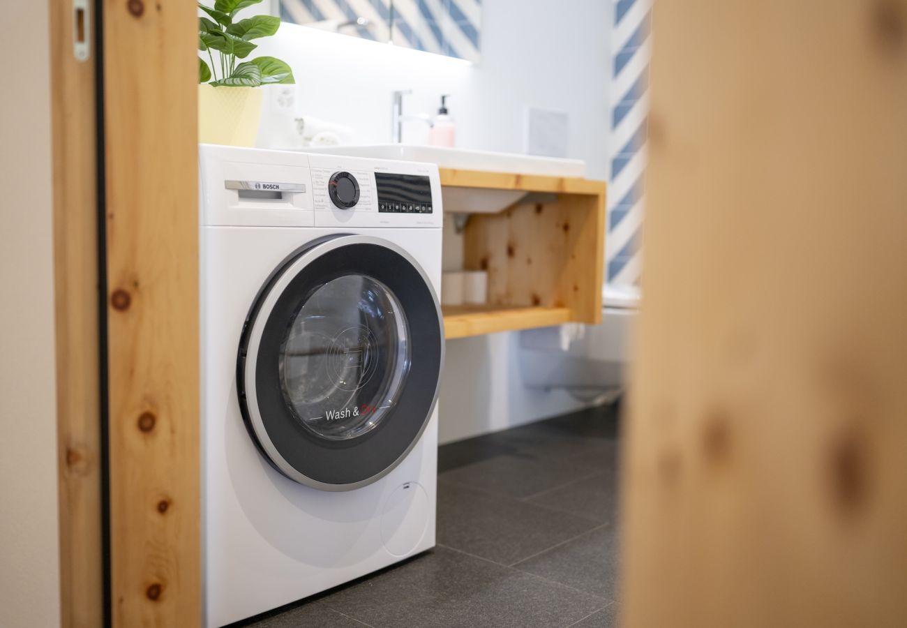 Ferienwohnung in Scuol - Chasa Stradun 203A – Zentrale 2-Zimmer-Ferienwohnung mit Balkon und Kamin in Scuol