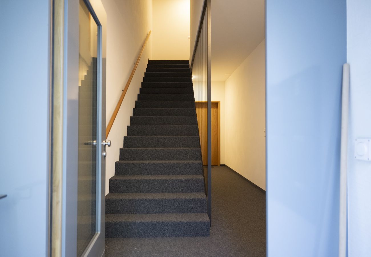 Ferienwohnung in Scuol - Chasa Stradun 203A – Zentrale 2-Zimmer-Ferienwohnung mit Balkon und Kamin in Scuol