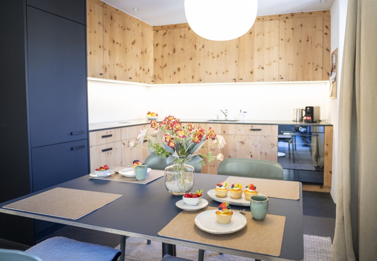 Ferienwohnung in Scuol - Chasa Stradun 203A – Zentrale 2-Zimmer-Ferienwohnung mit Balkon und Kamin in Scuol