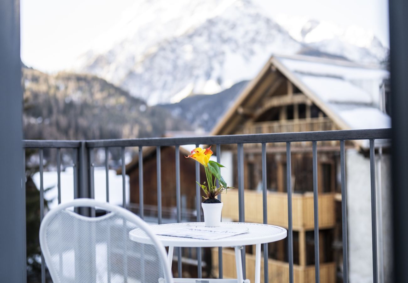Ferienwohnung in Scuol - Chasa Stradun 203A – Zentrale 2-Zimmer-Ferienwohnung mit Balkon und Kamin in Scuol