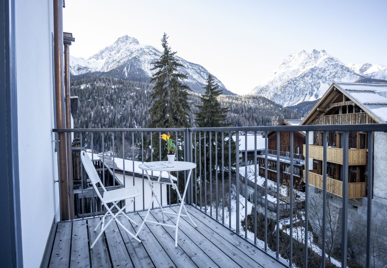Ferienwohnung in Scuol - Chasa Stradun 203A – Zentrale 2-Zimmer-Ferienwohnung mit Balkon und Kamin in Scuol